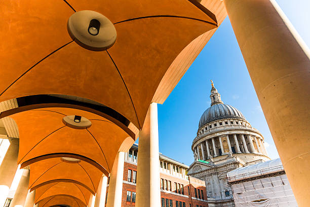 St Paul's Cathedral View of St Paul's Cathedral from Paternoster Square, London, UK. paternoster square stock pictures, royalty-free photos & images