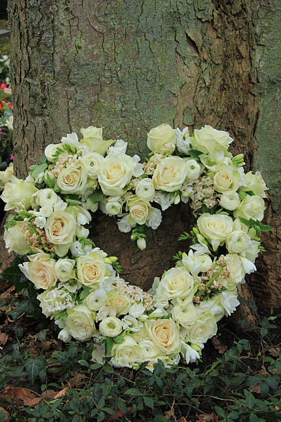 istock Heart shaped sympathy flowers 522170973