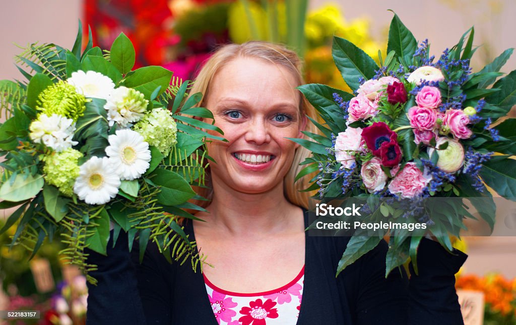 I have one for every occasion A cropped shot of a woman standing with a bouquet of flowers Adult Stock Photo