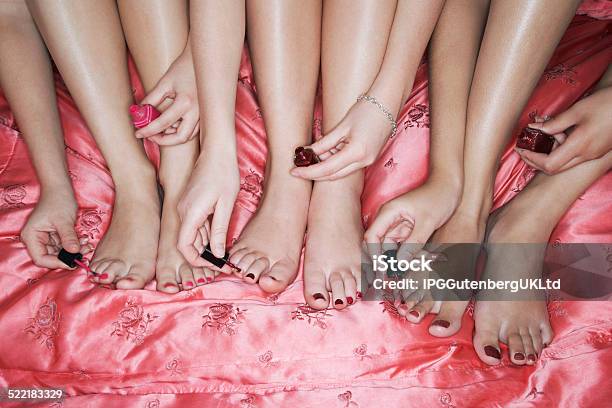 Painting Toenails On Pink Bedsheet Stock Photo - Download Image Now - Adolescence, Close-up, Conformity
