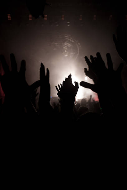 istock Group of people enjoying a concert 522183441