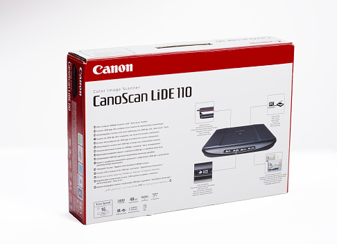 Rishon Le Zion, Israel - November 5, 2014: Cardboard box of CanoScan Lide 110. Ultra compact 2400dpi Scanner with 
