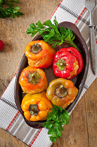 istock Stuffed peppers minced chicken with carrots with tomato sauce 522184493