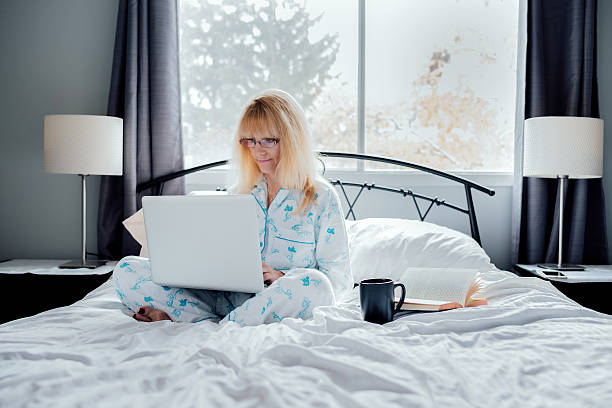 istock Businesswoman Working in Bed 522184863