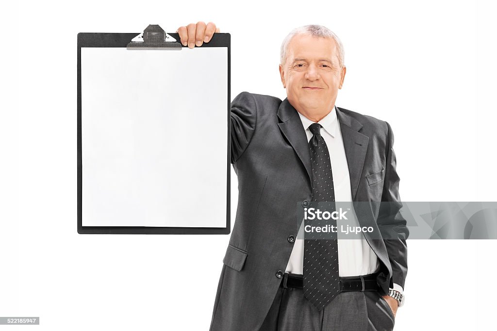 Mature man in formalwear holding a clipboard Mature man in formalwear holding a clipboard isolated on white background 50-59 Years Stock Photo