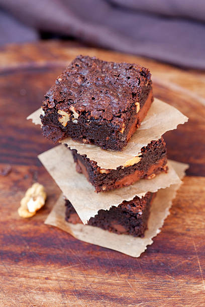 istock delicious crusty brownies on wood background 522186093