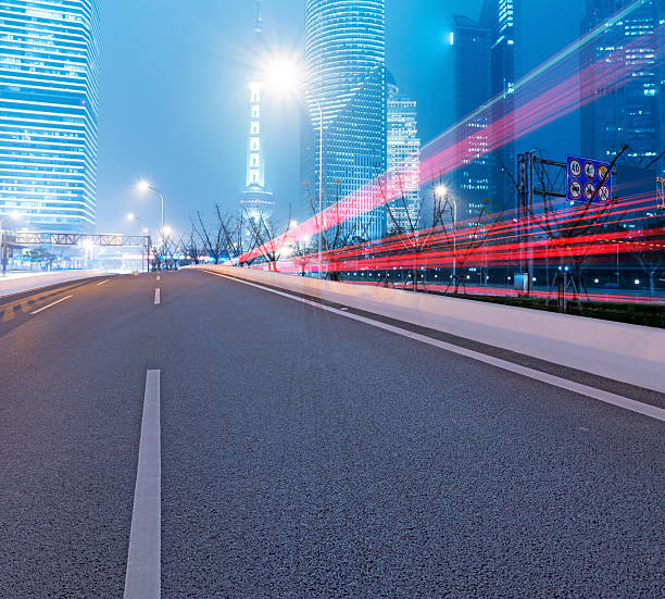 istock Asphalt road and modern city 522187057