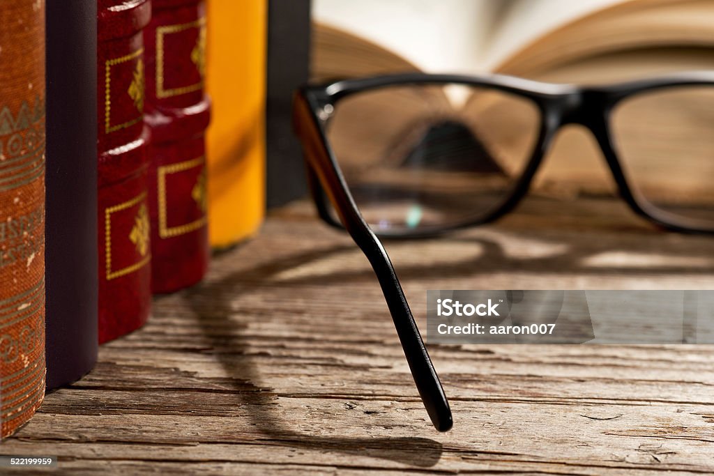 glasses with books taken under studio light with electronic flash Book Stock Photo