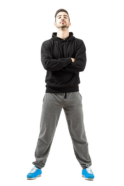 istock Confident young man with folded hands in the sportswear 522202993