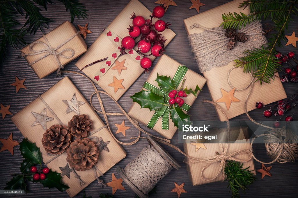 Christmas vintage present Christmas vintage present on a wooden background Brown Stock Photo