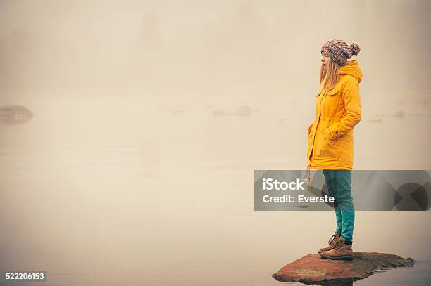 Young Woman Standing Alone Outdoor Travel Lifestyle Stock Photo - Download Image Now