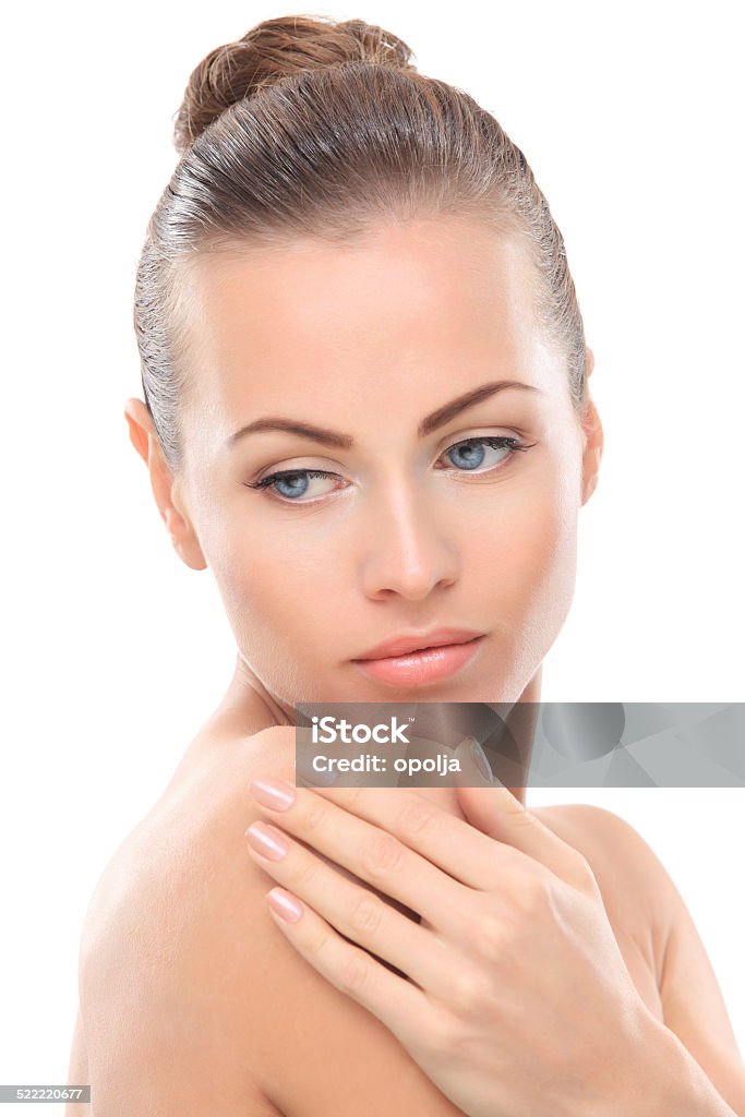 Beautiful Face of Young Woman with Clean Fresh Skin Beautiful Face of Young Woman with Clean Fresh Skin close up isolated on white. Beauty Portrait. Beautiful Spa Woman Smiling. Perfect Fresh Skin. Pure Beauty Model. Youth and Skin Care Concept 'at' Symbol Stock Photo