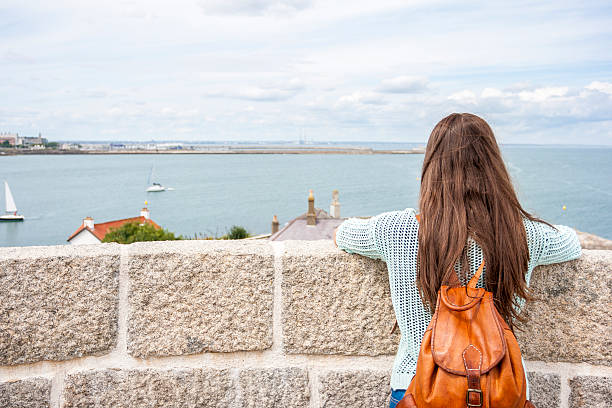 istock Rear view woman traveling 522222699