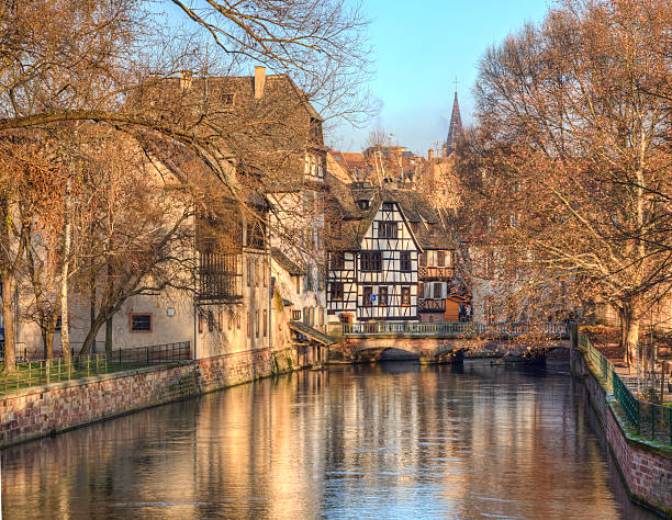 Beautiful reflections in a water canal during winter in Strasbourg.