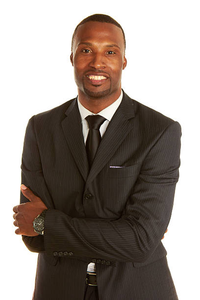 istock African American Businessman Smiling Over White Background 522224039