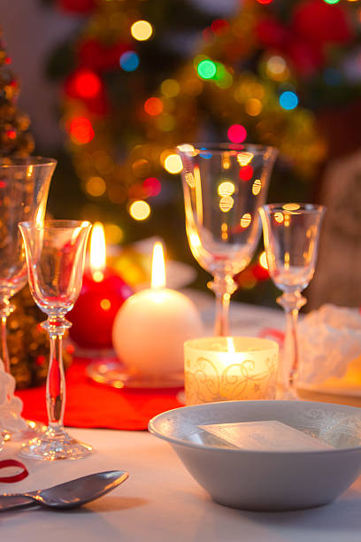 istock Candlelight, wafer and gifts on the Christmas table 522224607