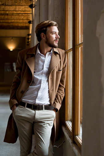 Young Stylish Man Looking Thrue Window Stock Photo - Download Image Now ...