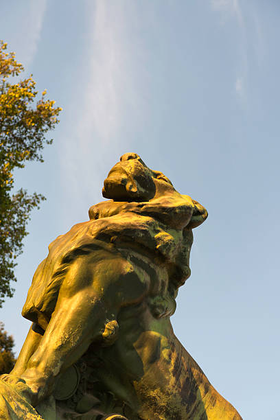 istock Bronze lion statue in the Retiro Park in Madrid 522225379
