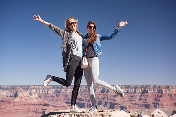 istock Female Tourists at Grand Canyon 522243377