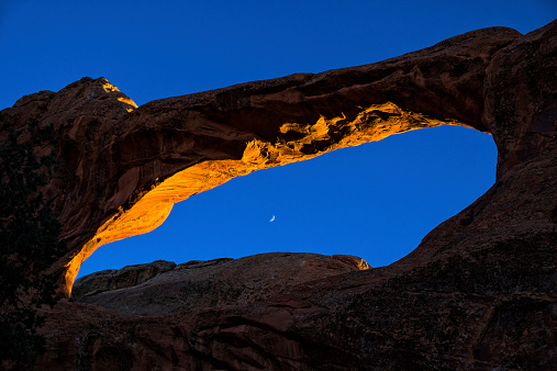 Double O Arch Scenic Landscape at Sunset - Arches National Park, Utah USA.
