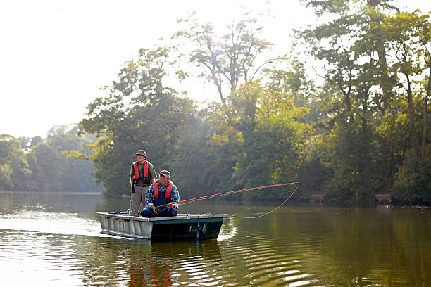istock Senor men having a good time fishing 522245237