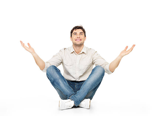 istock Sitting happy man with raised hands up 522246605