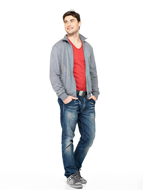 istock happy handsome man in grey jacket and blue jeans 522258393