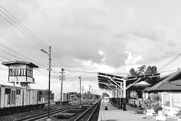 Photo of black and white railway station