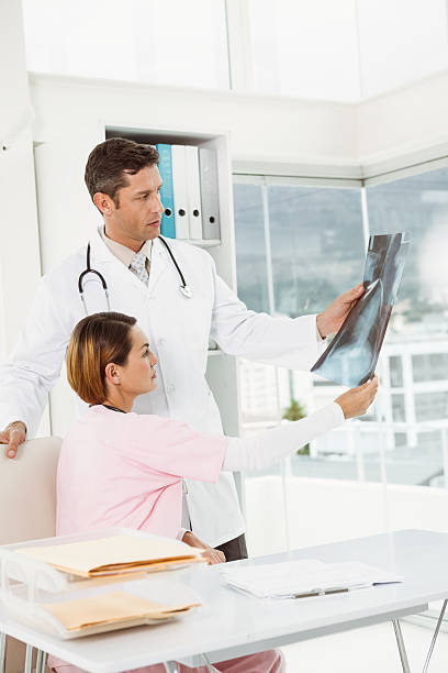 istock Doctors examining x-ray in medical office 522262153
