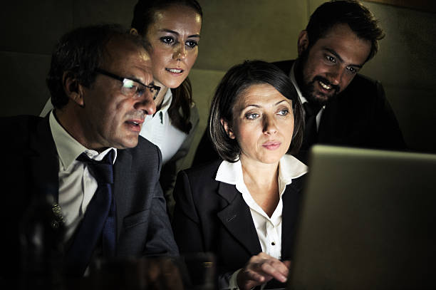 istock Group of colleagues working in late hours 522276839