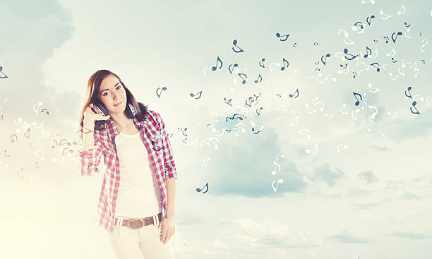 istock Girl with headphones 522278633
