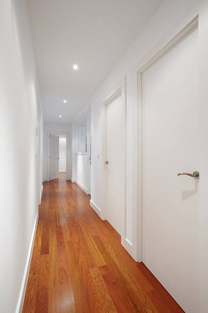 istock House corridor with white walls and parquet 522280627