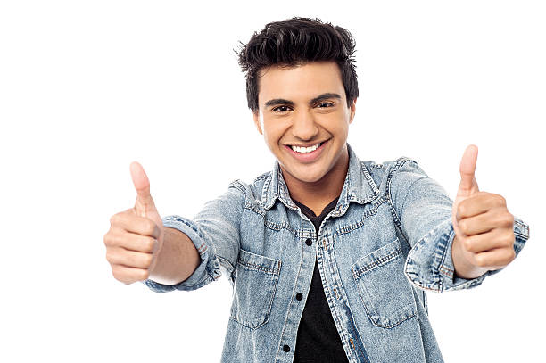 istock Successful young man giving thumbs up 522281717