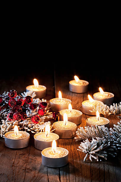 istock Tea lighter christmasdecoration on wooden background 522292331