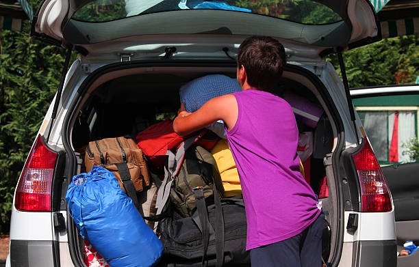 istock boy with purple undershirt car baggage charge 522292711