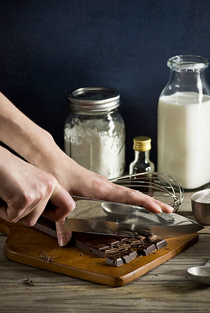 istock Cutting a Bar of Chocolate to Make Pudding 522294561