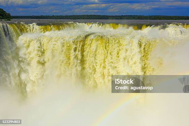 Impressive Iguacu Falls Devils Throat Front View And Rainbow Stock Photo - Download Image Now