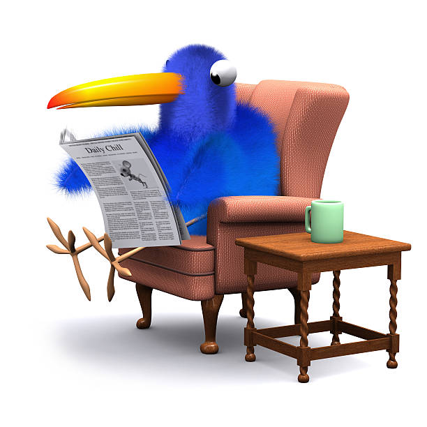istock 3d Blue bird reads the paper in a comfortable chair 522298499