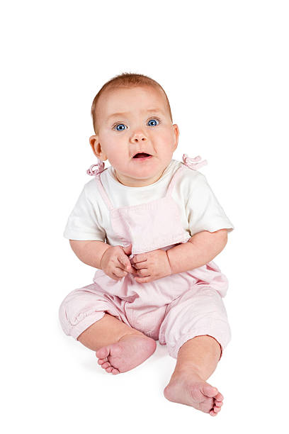 istock Baby girl sitting with open mouth 522298603