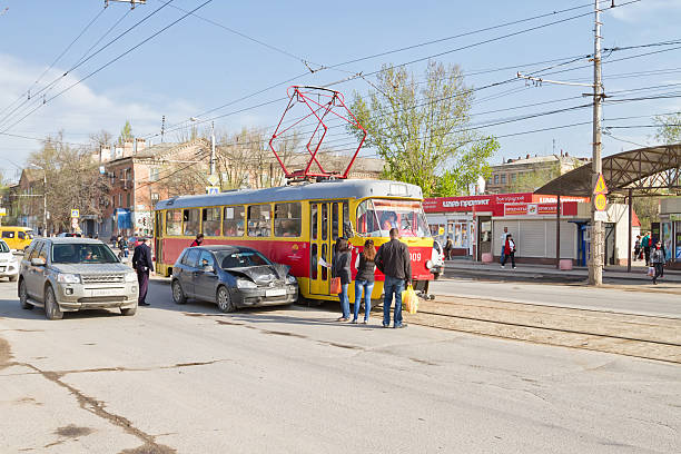 Volgograd, Russia - April 19, 2016:  car accident on the tram tracks prevents normal movement of urban electric transport