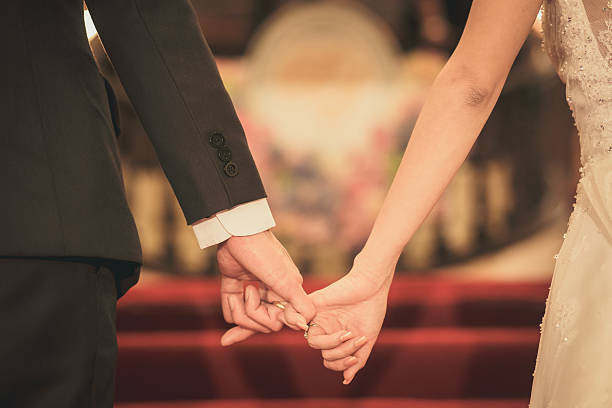 istock Bride and groom holding hand waiting for wedding ceremony 522303640