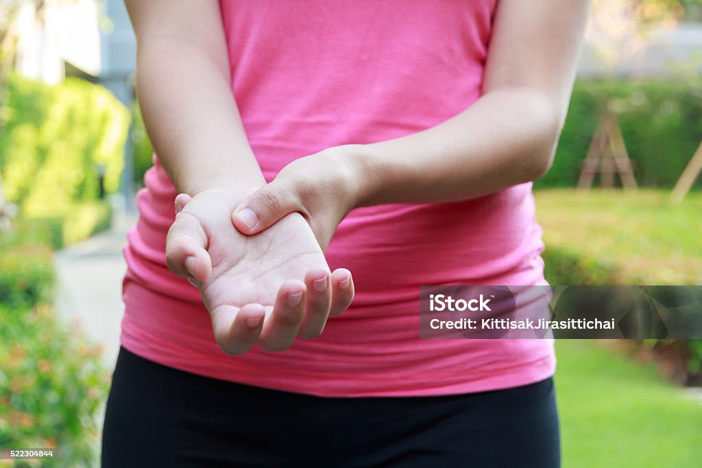 Woman hands pain Woman hands pain. Physical Injury Stock Photo