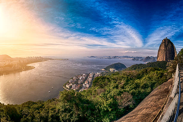 pôr do sol dourado com vista para o rio de janeiro, brasil - brazil sea nautical vessel urca - fotografias e filmes do acervo