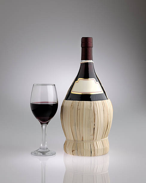 istock flagon of red wine with glass 522305646