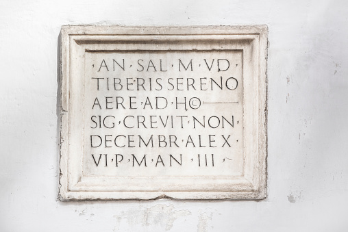 Tiber flood mark on (very) old building (in Rome, Italy) marks the level of the water surface during a flood in 1495 (almost 17 meter above the normal level). The text on the marble plaque reads (in latin): ANNO SALUTE 1495 TIBERIS SERENO AERE AD HOC SIGNUM CREVIT NONIS DECEMBRIS ALEXANDRI VI PONTIFCIS MAXIMI ANNO III. In English the text translates to: In the year of grace 1495, on a clear day, the (surface of the) river Tiber rose to this mark - December 5th in Alexander VI's 3rd year as pope.