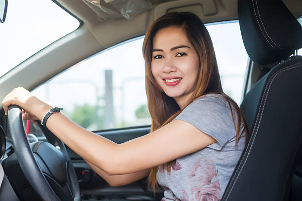 istock Beautiful women smiling in the car 522306640