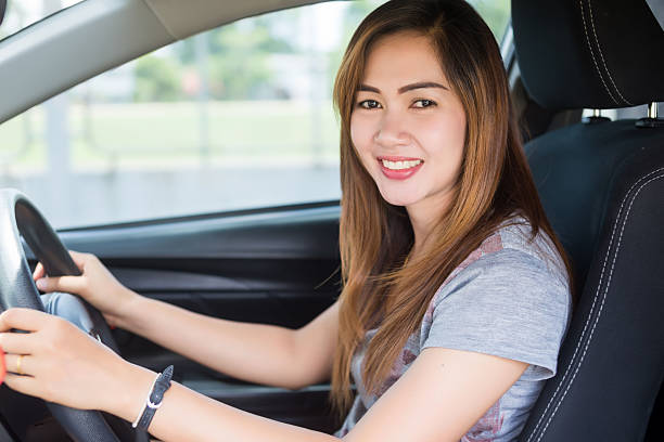 istock Beautiful women smiling in the car 522306674