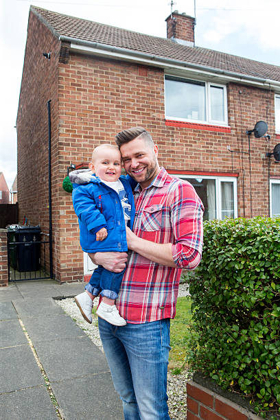 istock Father and son outside their home 522306726