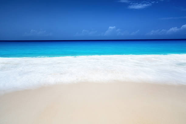 istock seychelles beach in sunny day, long exposure blur 522309108