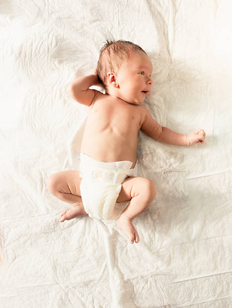 A newborn baby that was just born at the hospital.